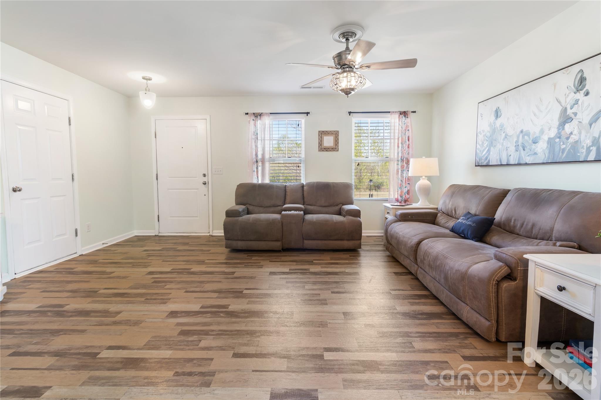 905 Alta Way Kannapolis, NC 28081 - Photo 5 of 24 a living room with furniture and a flat screen tv