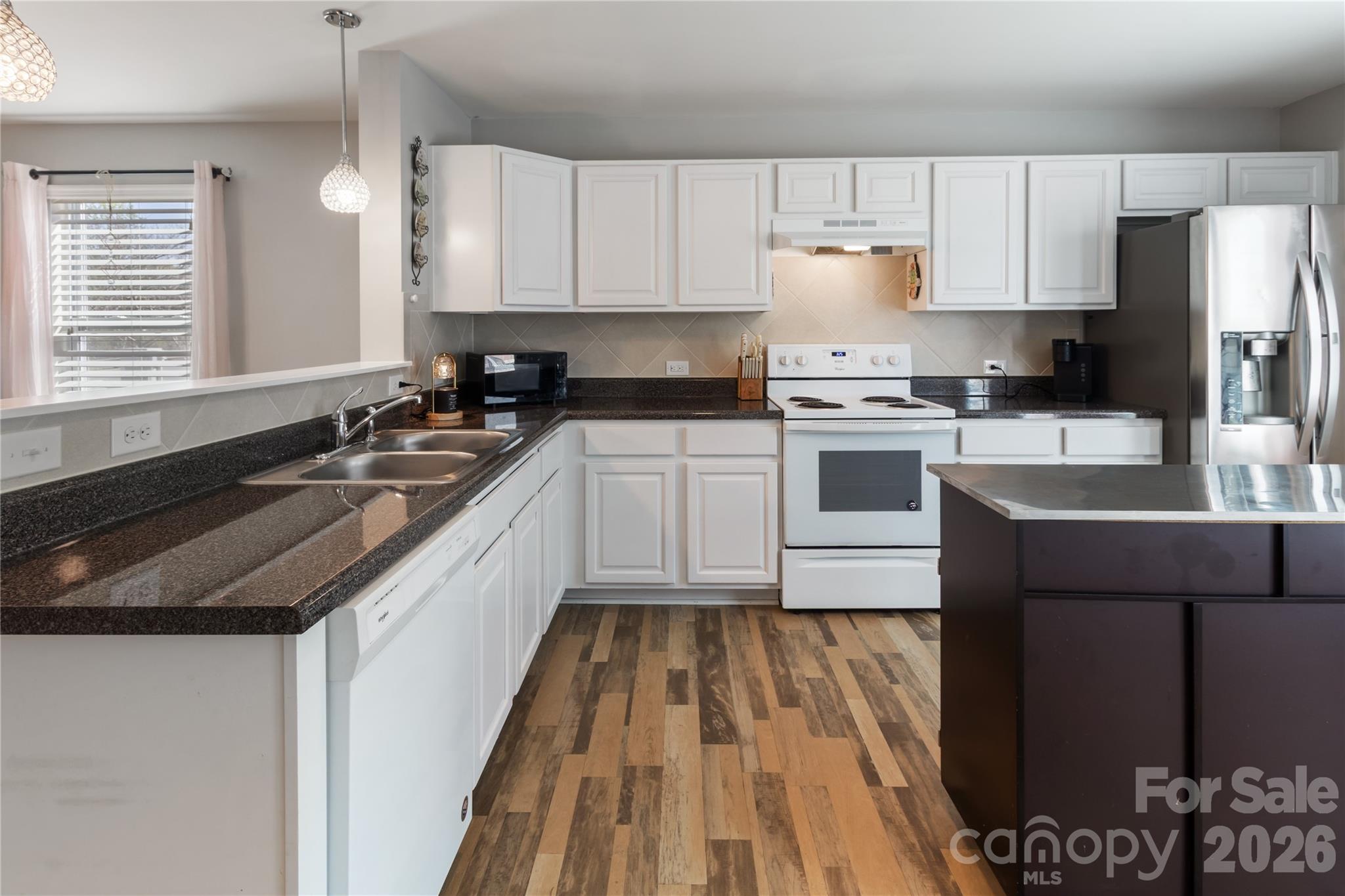 905 Alta Way Kannapolis, NC 28081 - Photo 8 of 24 a kitchen with a sink stove and refrigerator