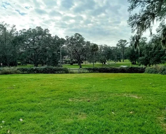 a view of building and trees in the background