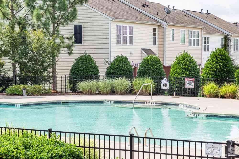 8225 Pilots View Drive Raleigh, NC 27617 - Photo 19 of 20 Just TWO doors away from the pool and directly across from one of 3 entrances, you'll be in the heart of this active, fun community!