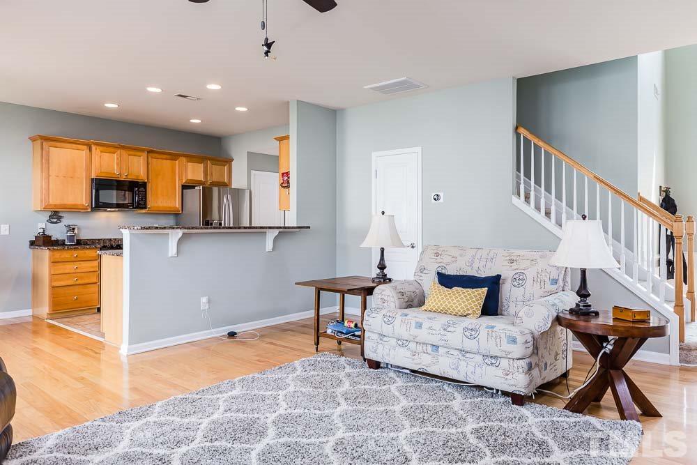 8225 Pilots View Drive Raleigh, NC 27617 - Photo 5 of 20 Fully open with a dedicated dining area (currently used as a home office and not pictured) - perfect for entertaining!