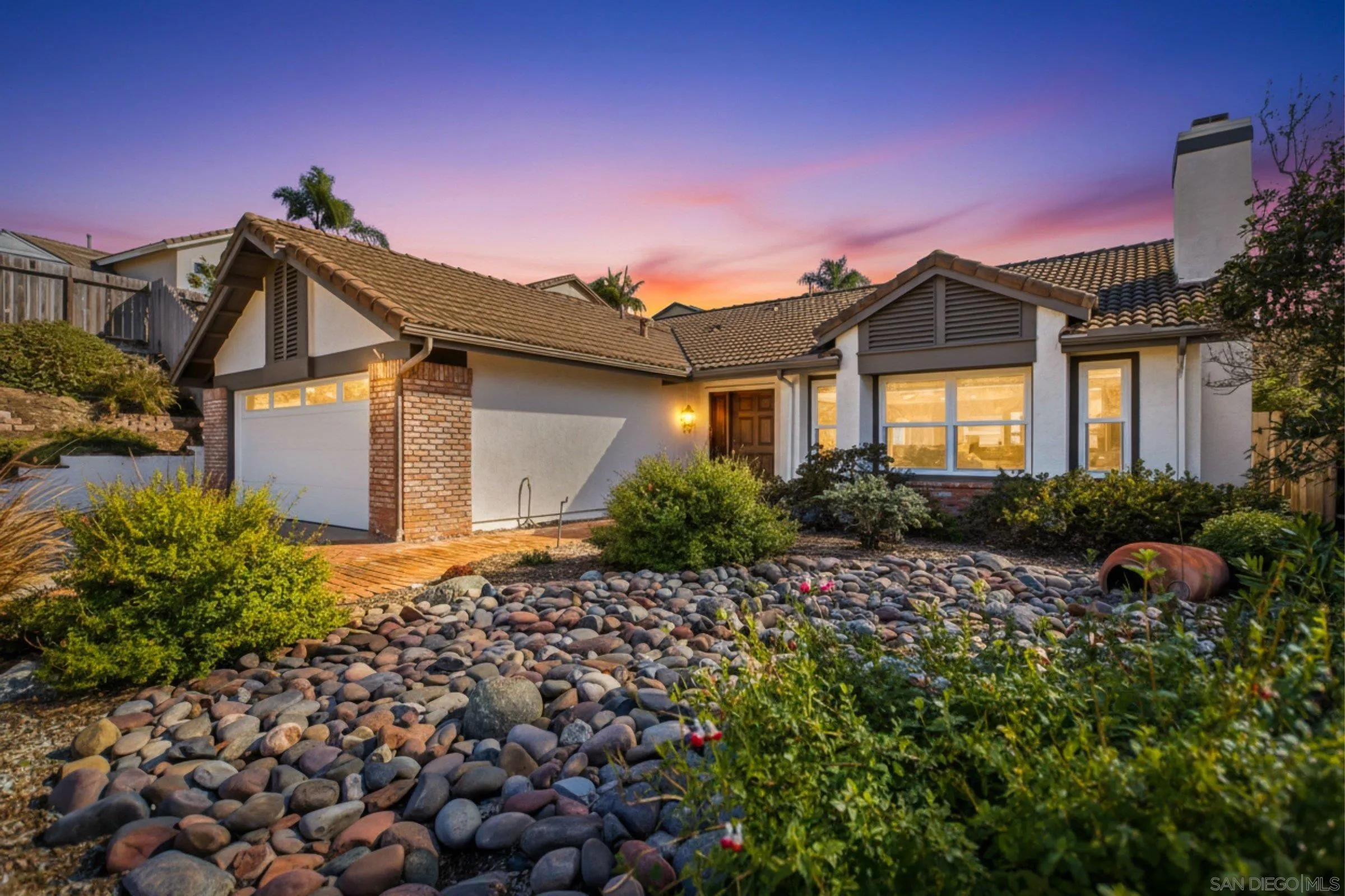 1693 Honeysuckle Court Encinitas, CA 92024 - Photo 1 of 1 a front view of a house with a yard