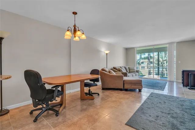 a work room with furniture and window