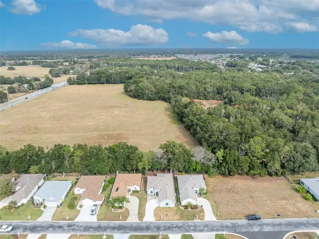 front view of a house with a swimming pool