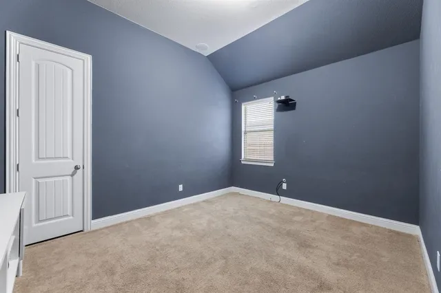 a bathroom with a granite countertop sink a mirror and a shower