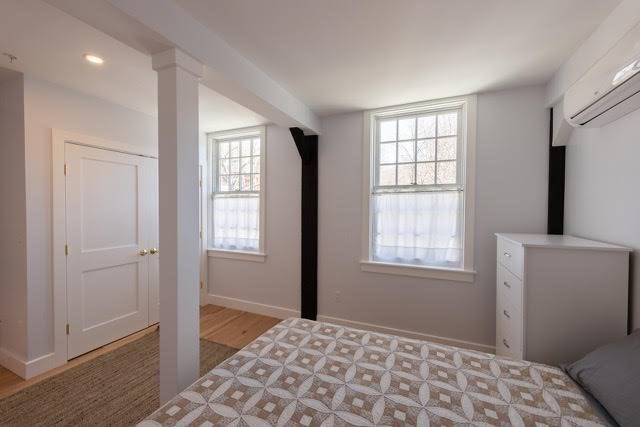 10 Deerfield Avenue, Unit 5 Shelburne, MA 01370 - Photo 17 of 28 a bedroom with a bed and a window
