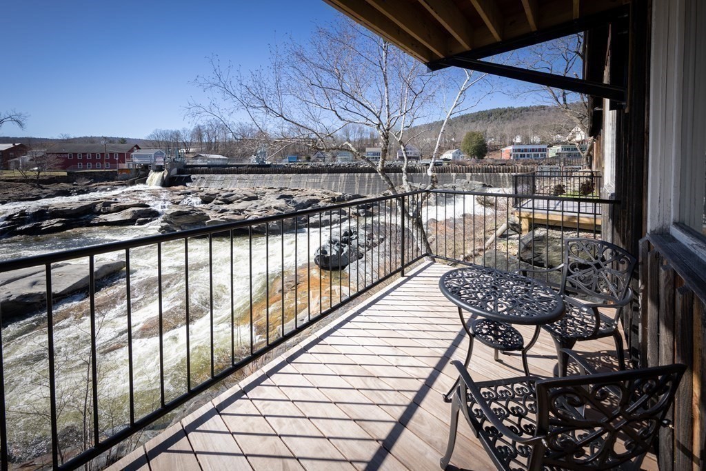 10 Deerfield Avenue, Unit 5 Shelburne, MA 01370 - Photo 2 of 28 a view of a balcony with chairs