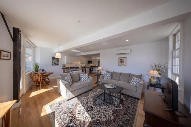 a living room with furniture and a couch