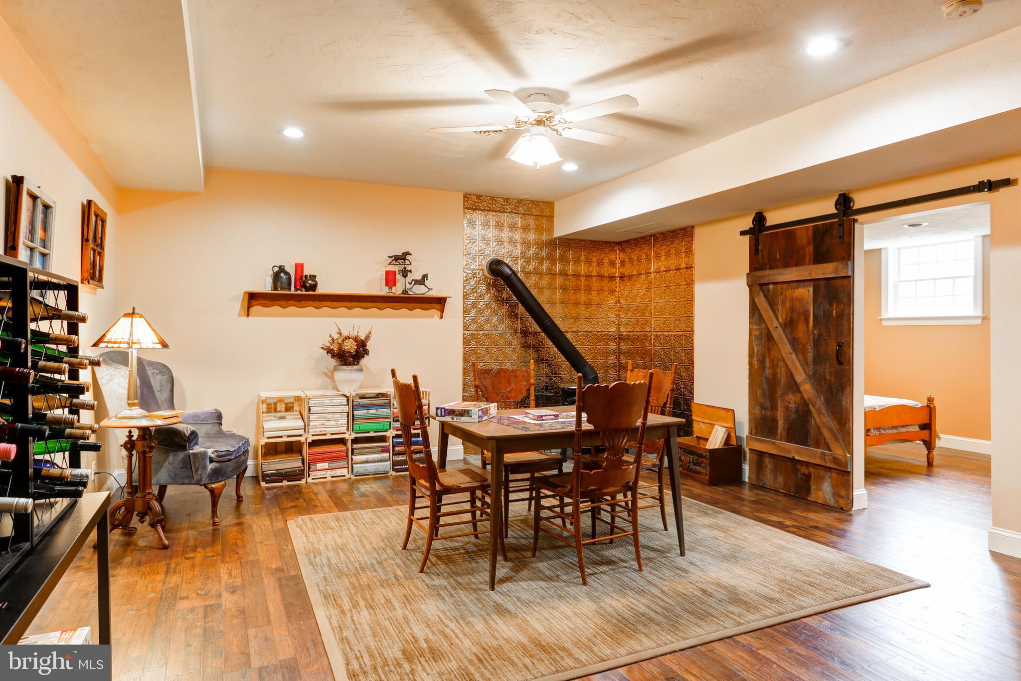 667 South River Road Halifax, PA 17032 - Photo 47 of 82 Lower level family room with woodstove