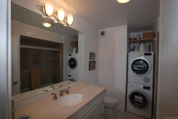 a bathroom with a sink and a toilet