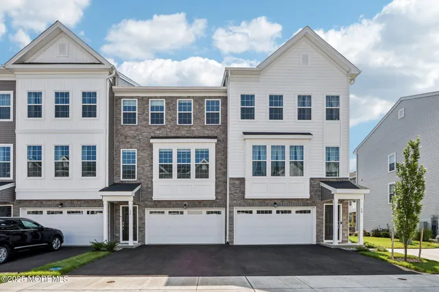 a front view of a large white building