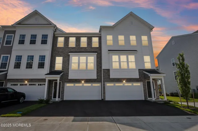 a front view of a house with a porch