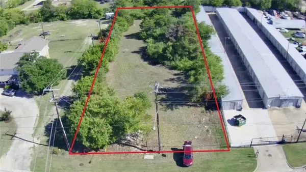 an aerial view of house with yard