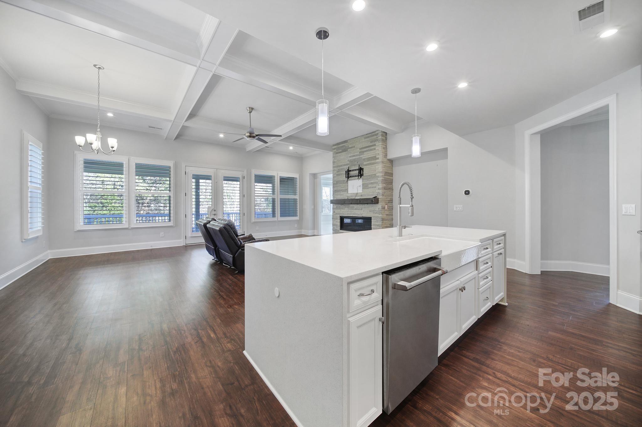 3509 Aqua Point Drive York, SC 29745 - Photo 12 of 48 a kitchen with stove and wooden floor