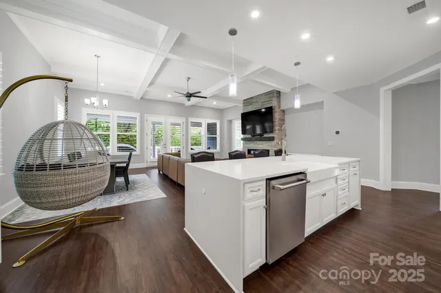 a view of living room with furniture and flat screen tv