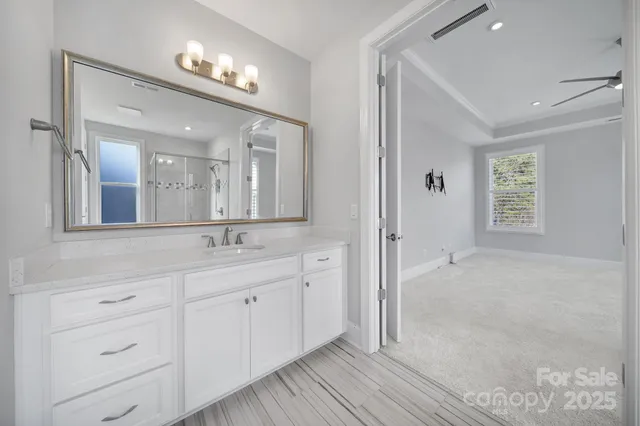 a view of a porch with furniture and a backyard