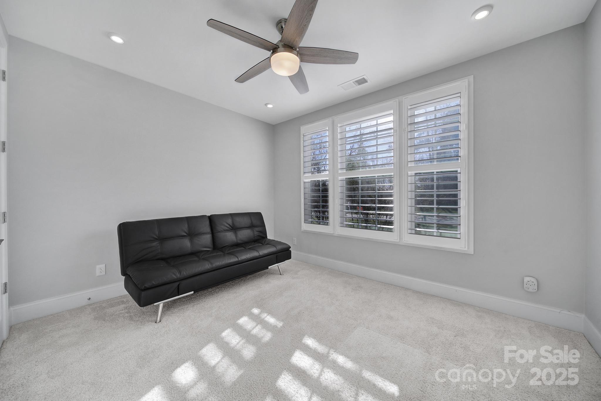 3509 Aqua Point Drive York, SC 29745 - Photo 4 of 48 a living room with furniture and a large window