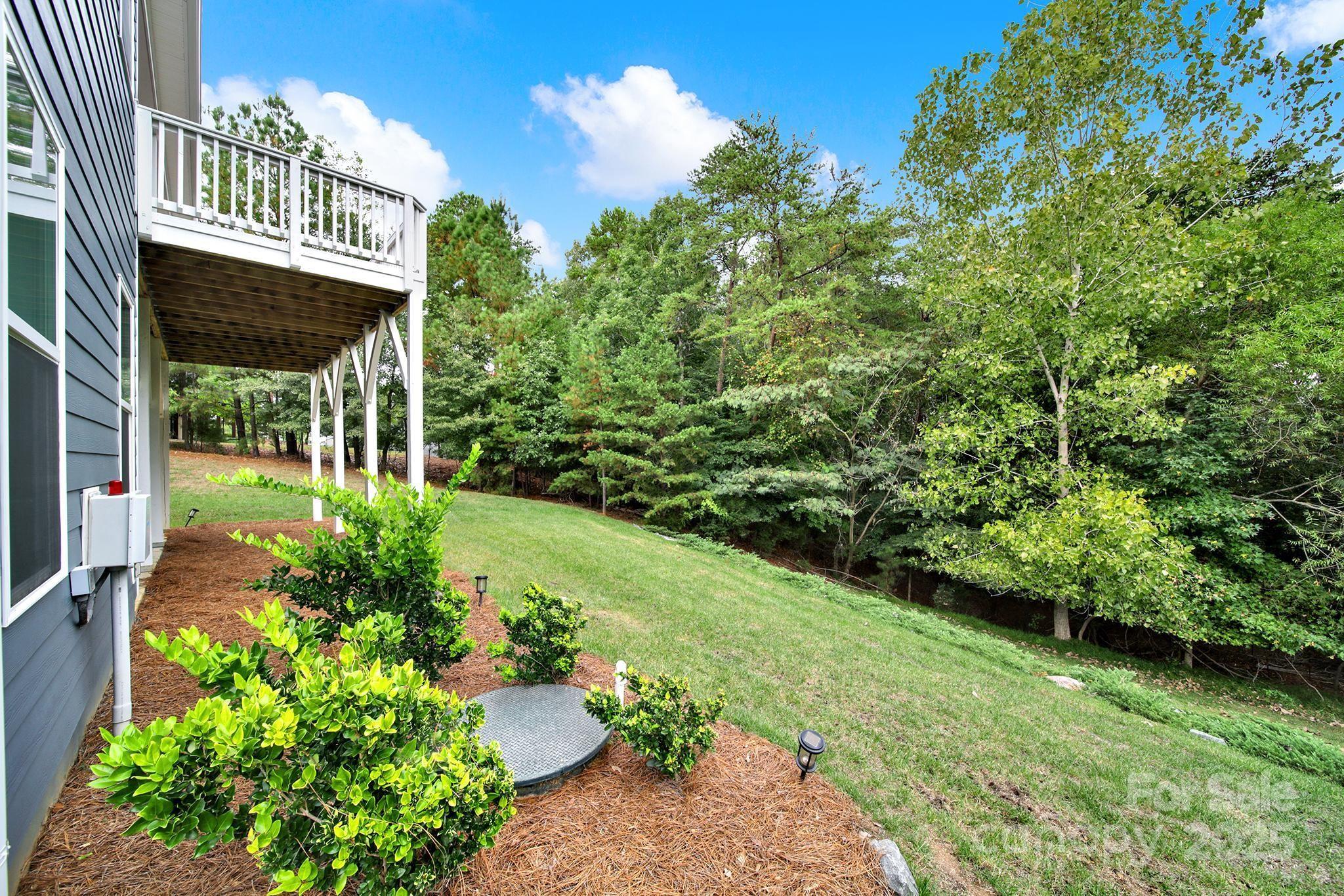 3509 Aqua Point Drive York, SC 29745 - Photo 42 of 48 a view of a pathway of a house with a garden