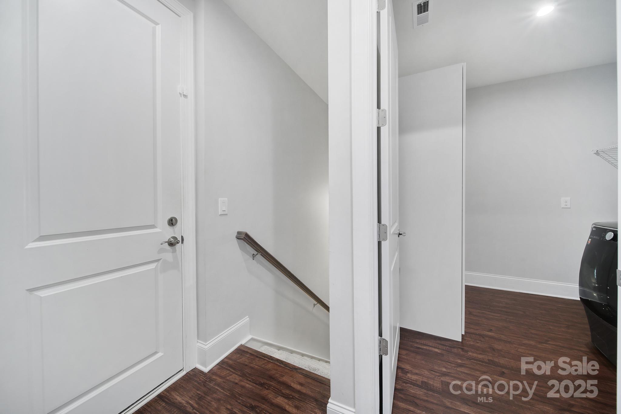 3509 Aqua Point Drive York, SC 29745 - Photo 6 of 48 a view of a hallway with wooden floor