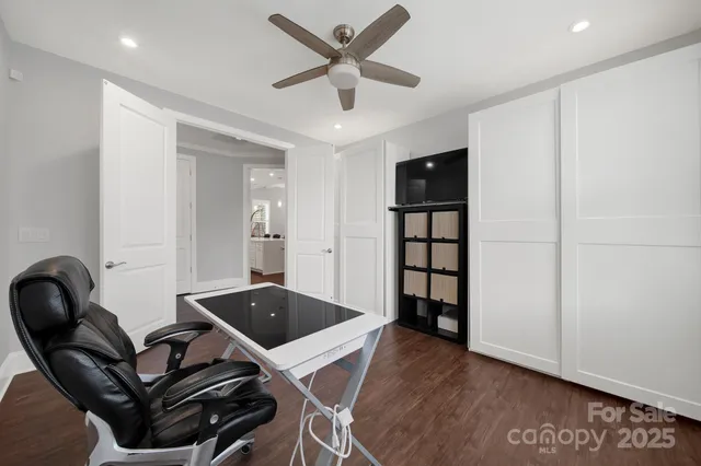 a kitchen with a table and chairs