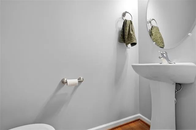 a bathroom with a sink and mirror