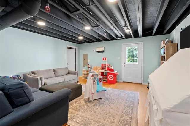 a living room with furniture and a couch