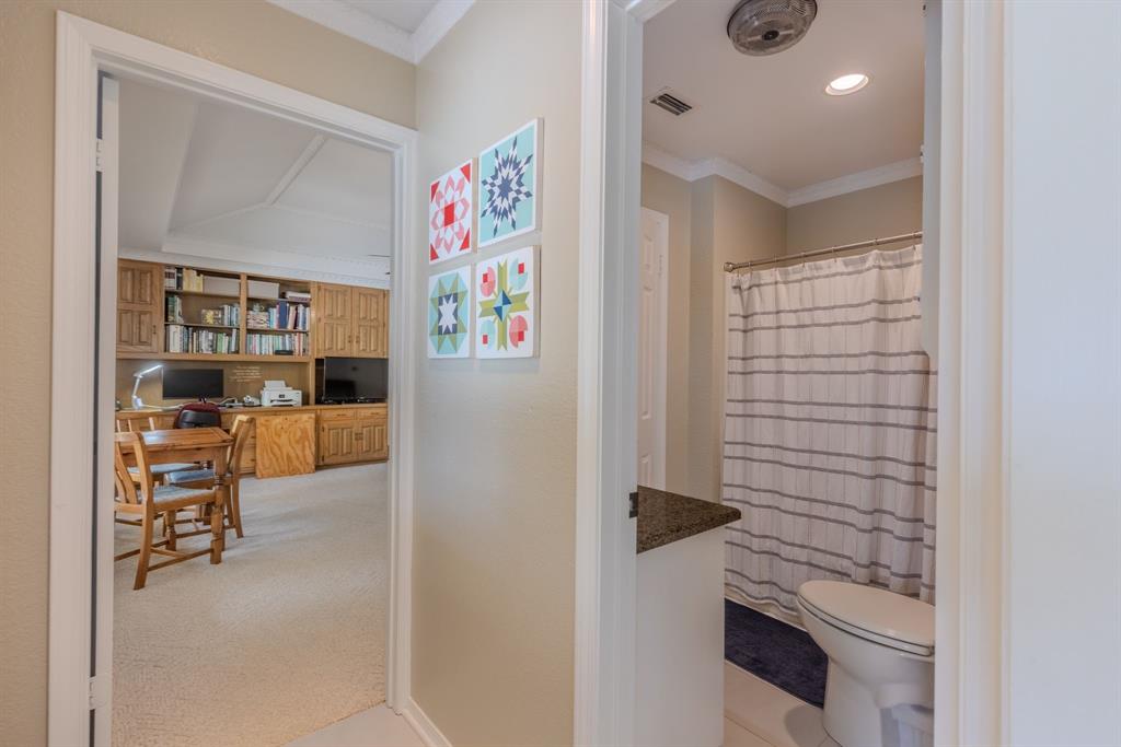 166 County Road 2112 Pittsburg, TX 75686 - Photo 12 of 40 a view of walk in closet with clothes and shoes