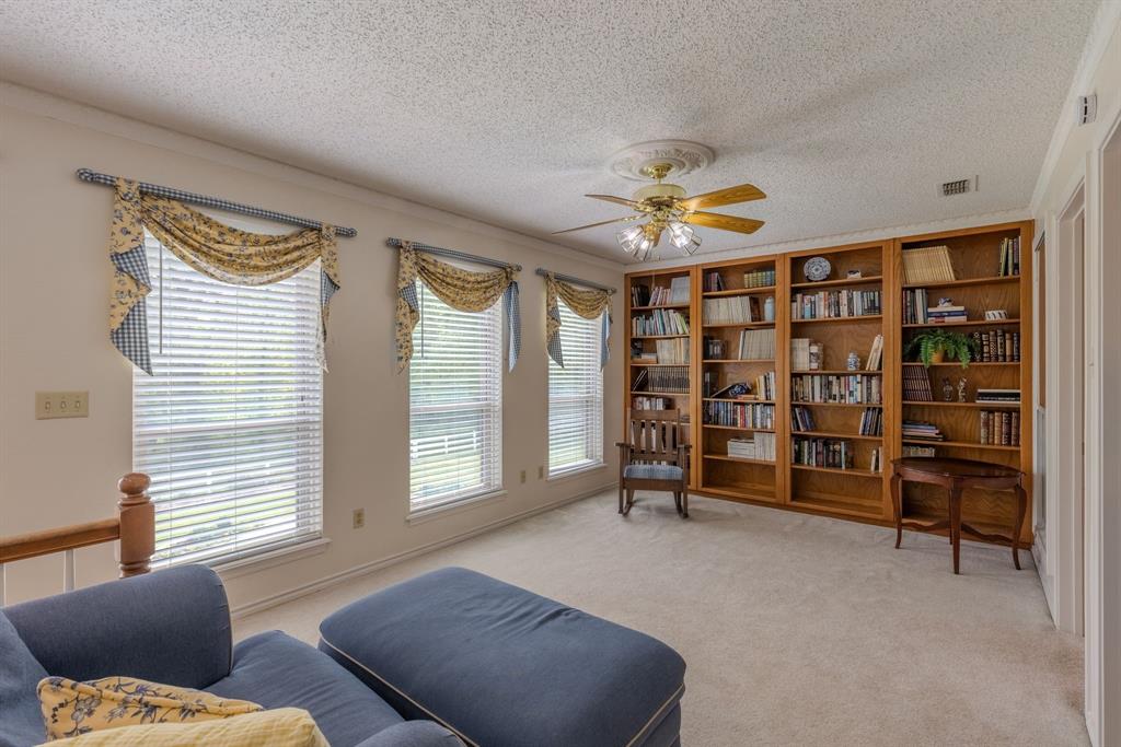 166 County Road 2112 Pittsburg, TX 75686 - Photo 20 of 40 a bedroom with furniture and a large window
