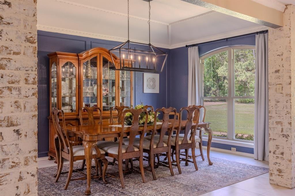 166 County Road 2112 Pittsburg, TX 75686 - Photo 9 of 40 a view of a dining room with furniture window and outside view