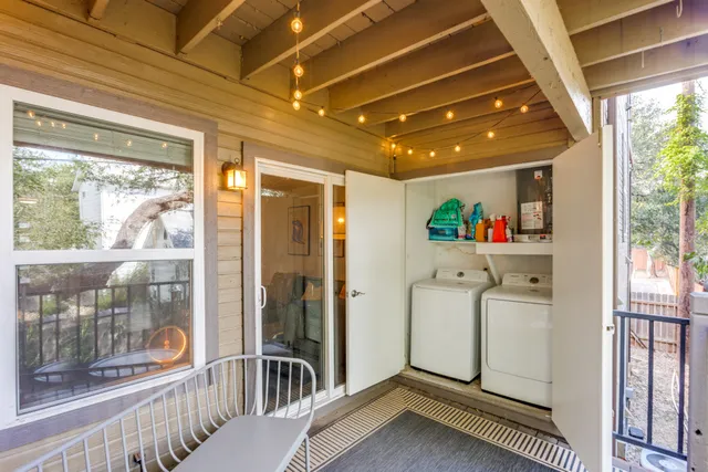 a room with water heater and a window