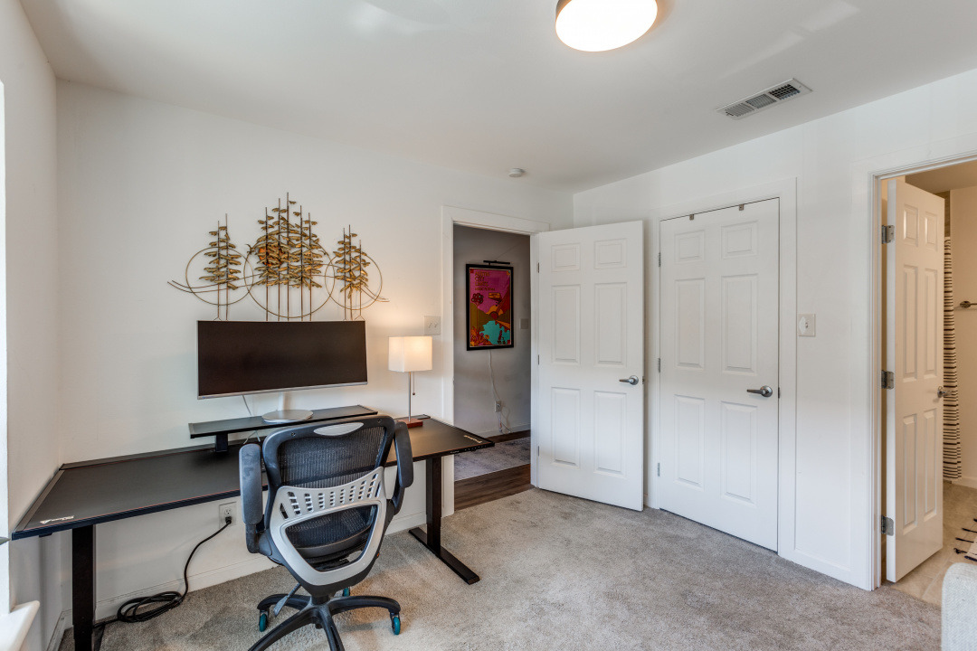 3604 Clawson Road, Unit 202 Austin, TX 78704 - Photo 10 of 23 a view of a workspace with furniture and a window