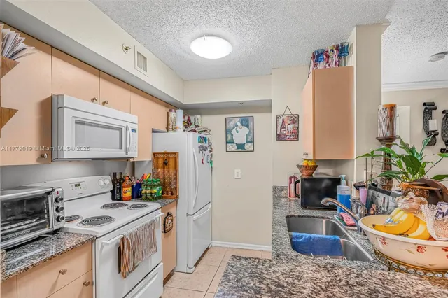 $315,000 | 2433 Centergate Drive, Unit 102, Miramar, FL 33025
