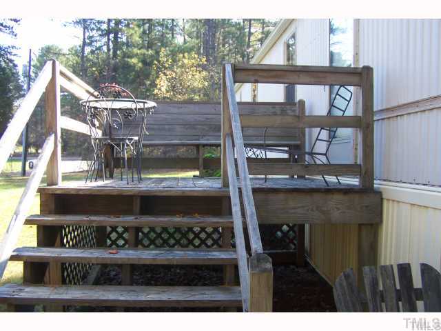 88 North Piney Grove Road Manson, NC 27553 - Photo 2 of 7 Deck on side with view of lake