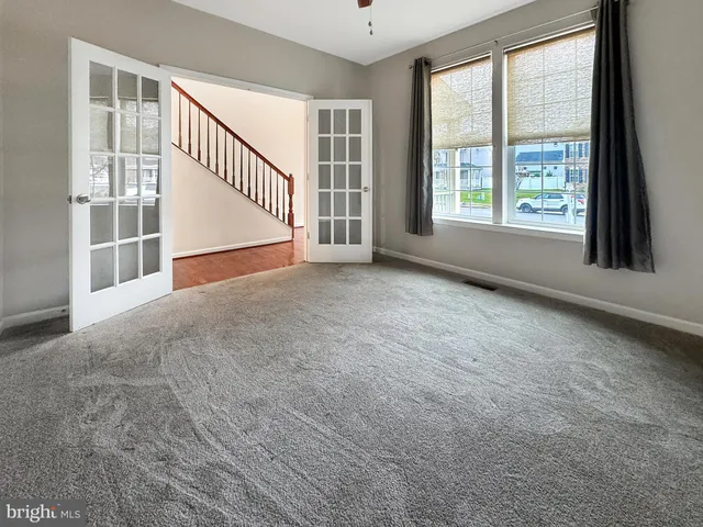 an empty room with windows