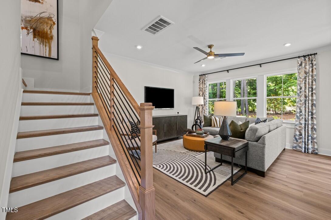 4734 Cypress Tree Lane Raleigh, NC 27612 - Photo 22 of 37 Elm Park 48_Living Room 1_6.24.24_webrea