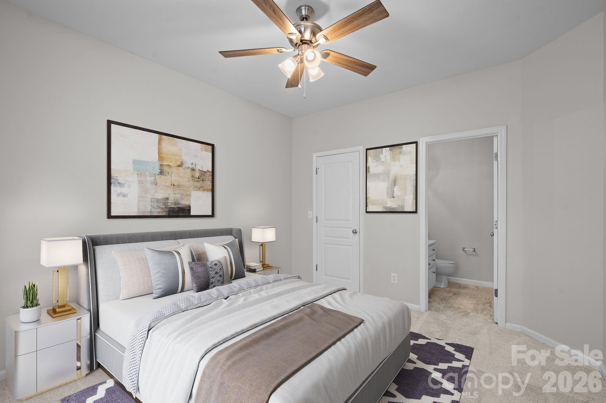 4966 Sunset Ridge Court Charlotte, NC 28269 - Photo 18 of 42 a bedroom with a bed and a painting on the wall