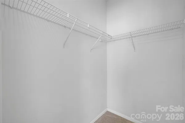 a workspace with furniture and a potted plant