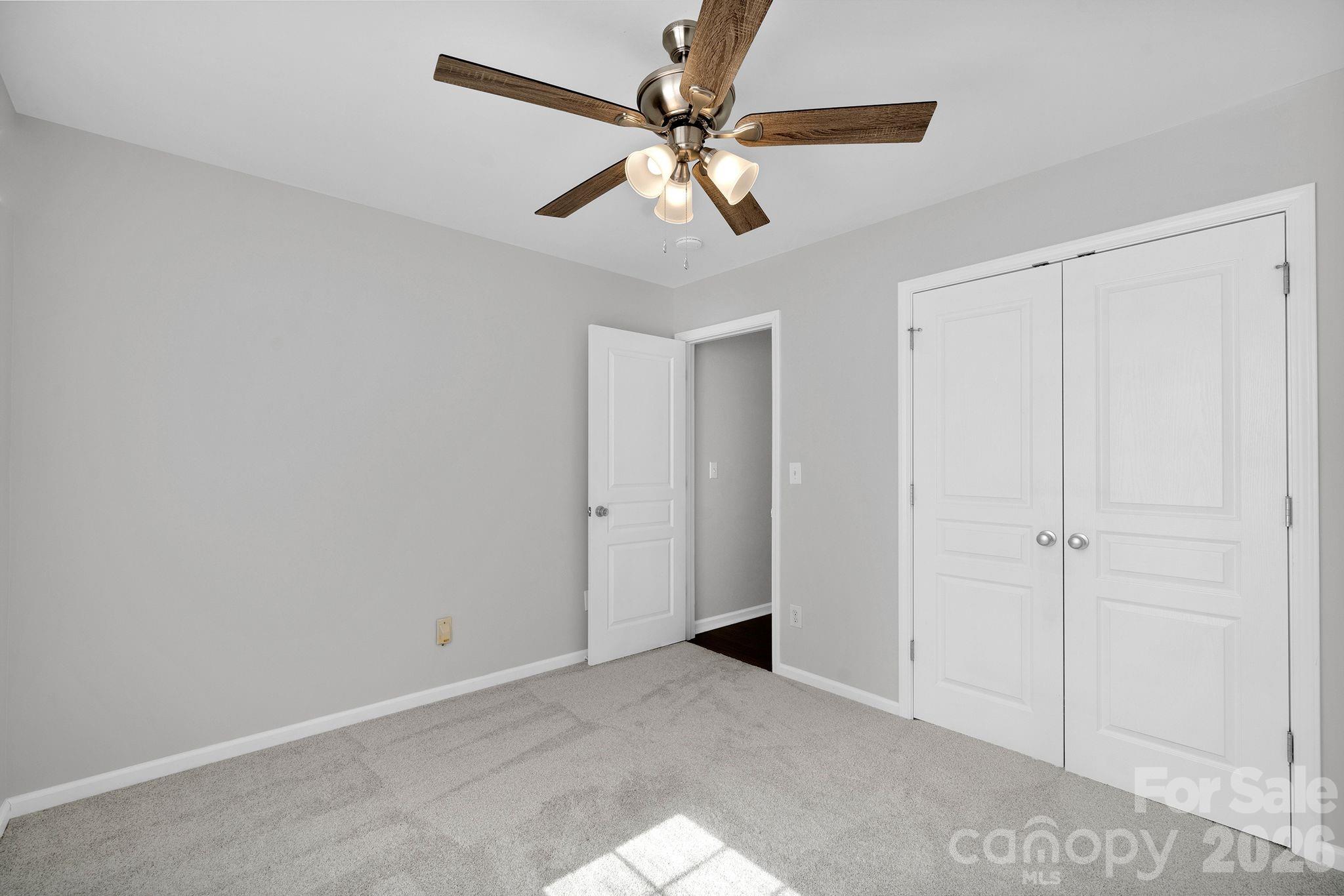 4966 Sunset Ridge Court Charlotte, NC 28269 - Photo 28 of 42 a view of an empty room