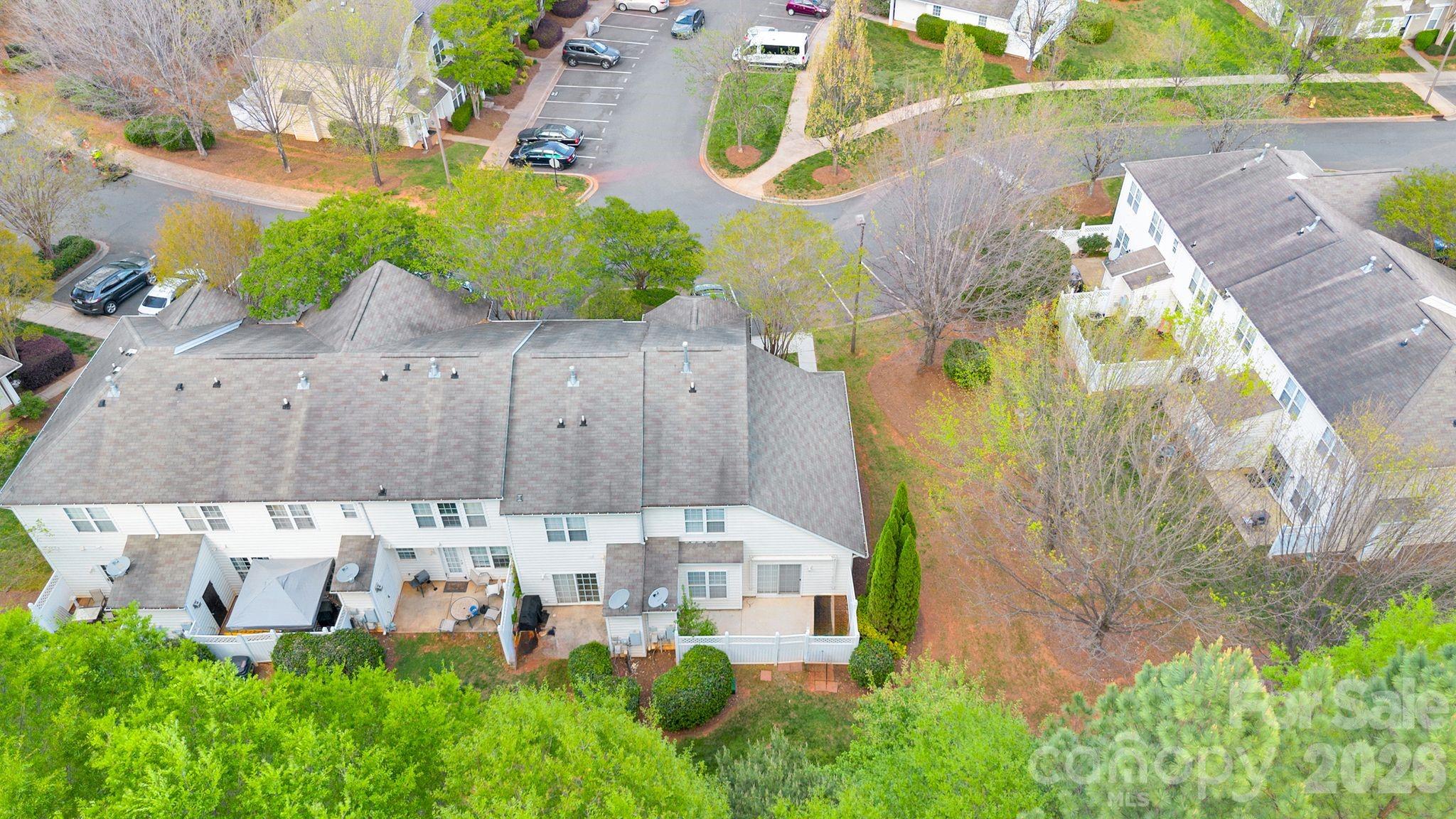 4966 Sunset Ridge Court Charlotte, NC 28269 - Photo 39 of 42 an aerial view of a house with a garden and plants