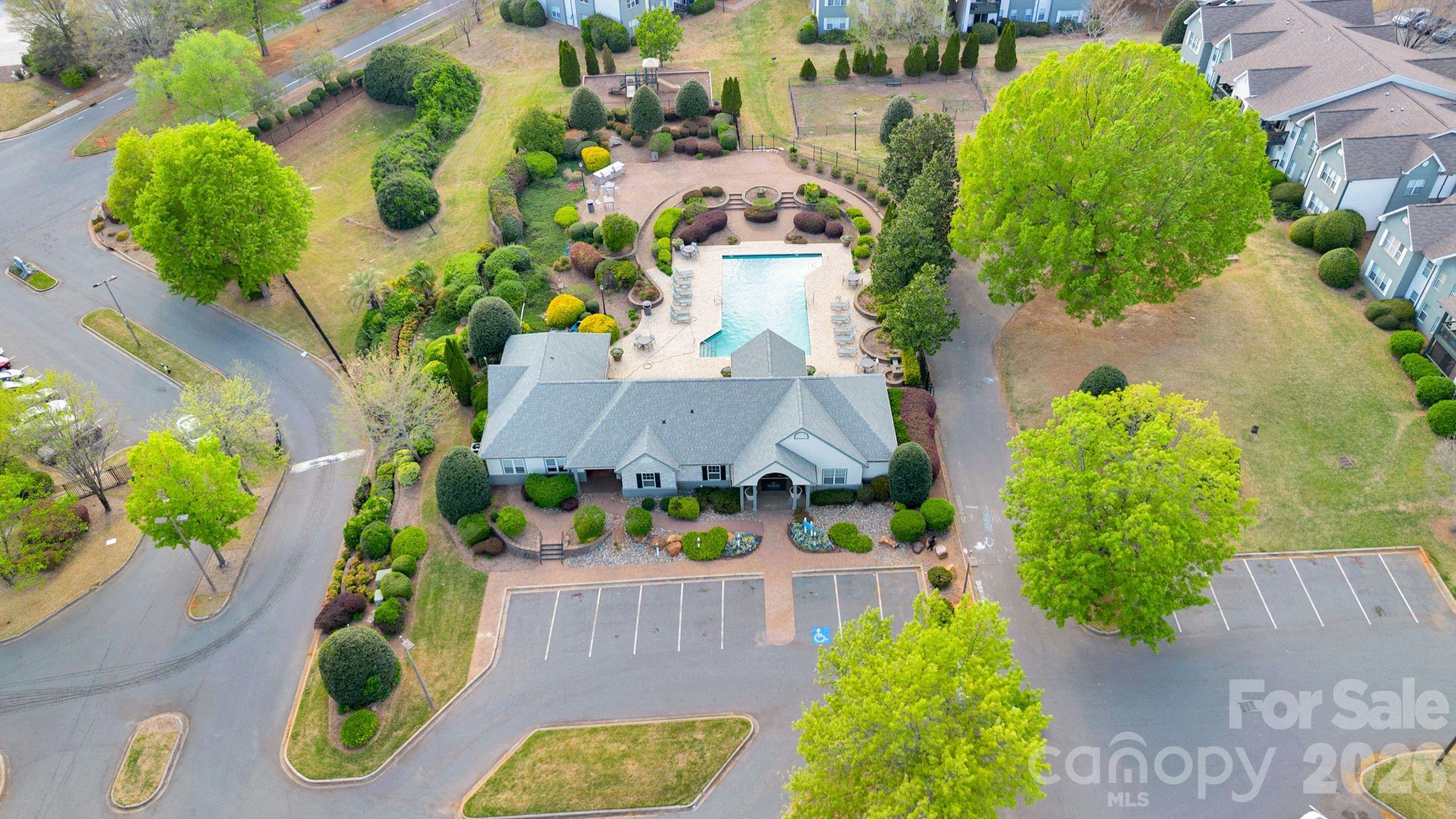 4966 Sunset Ridge Court Charlotte, NC 28269 - Photo 41 of 42 an aerial view of house with yard swimming pool and outdoor seating