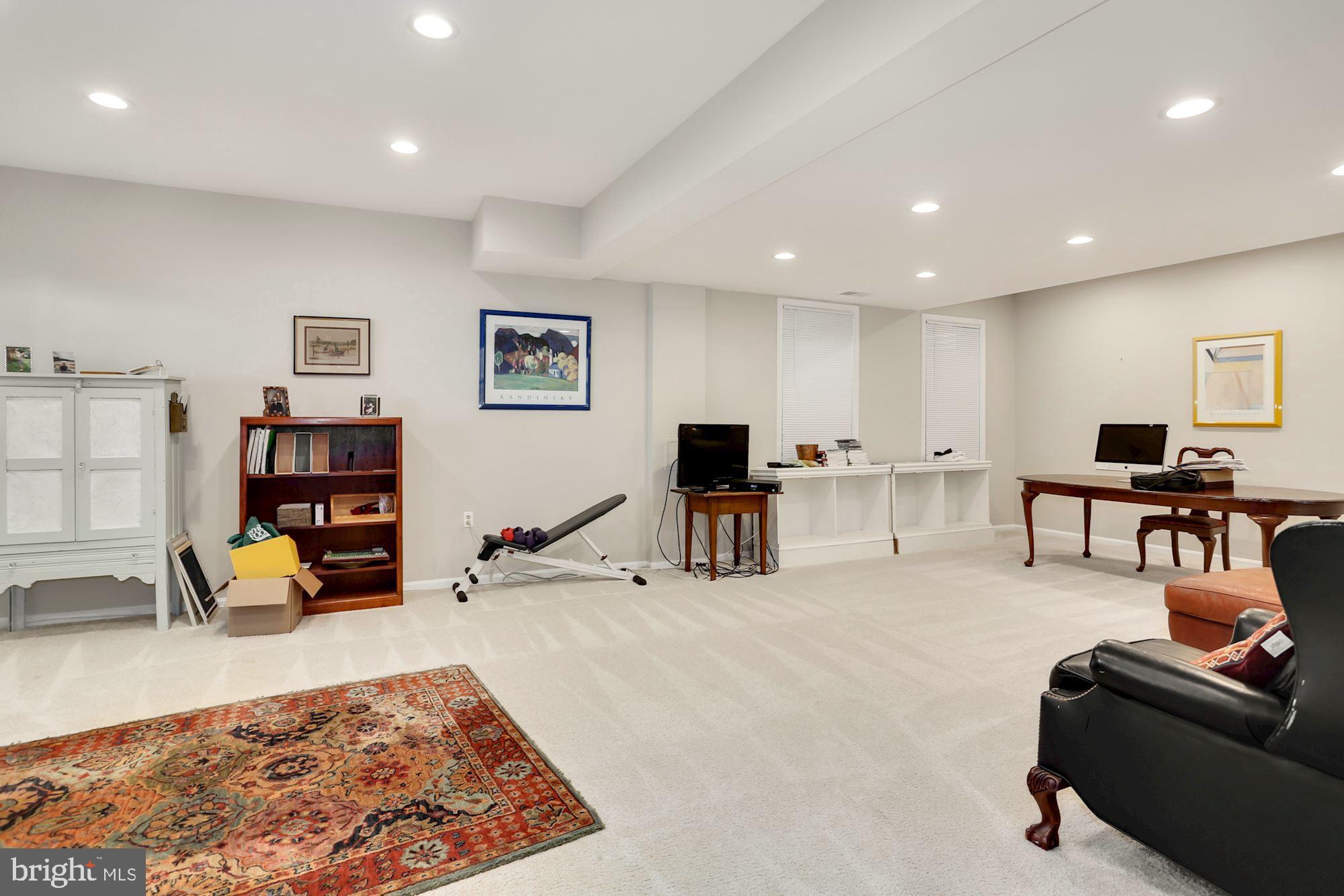 5108 Warren Place Northwest Washington, DC 20016 - Photo 25 of 32 Expansive Lower Level Rec Room