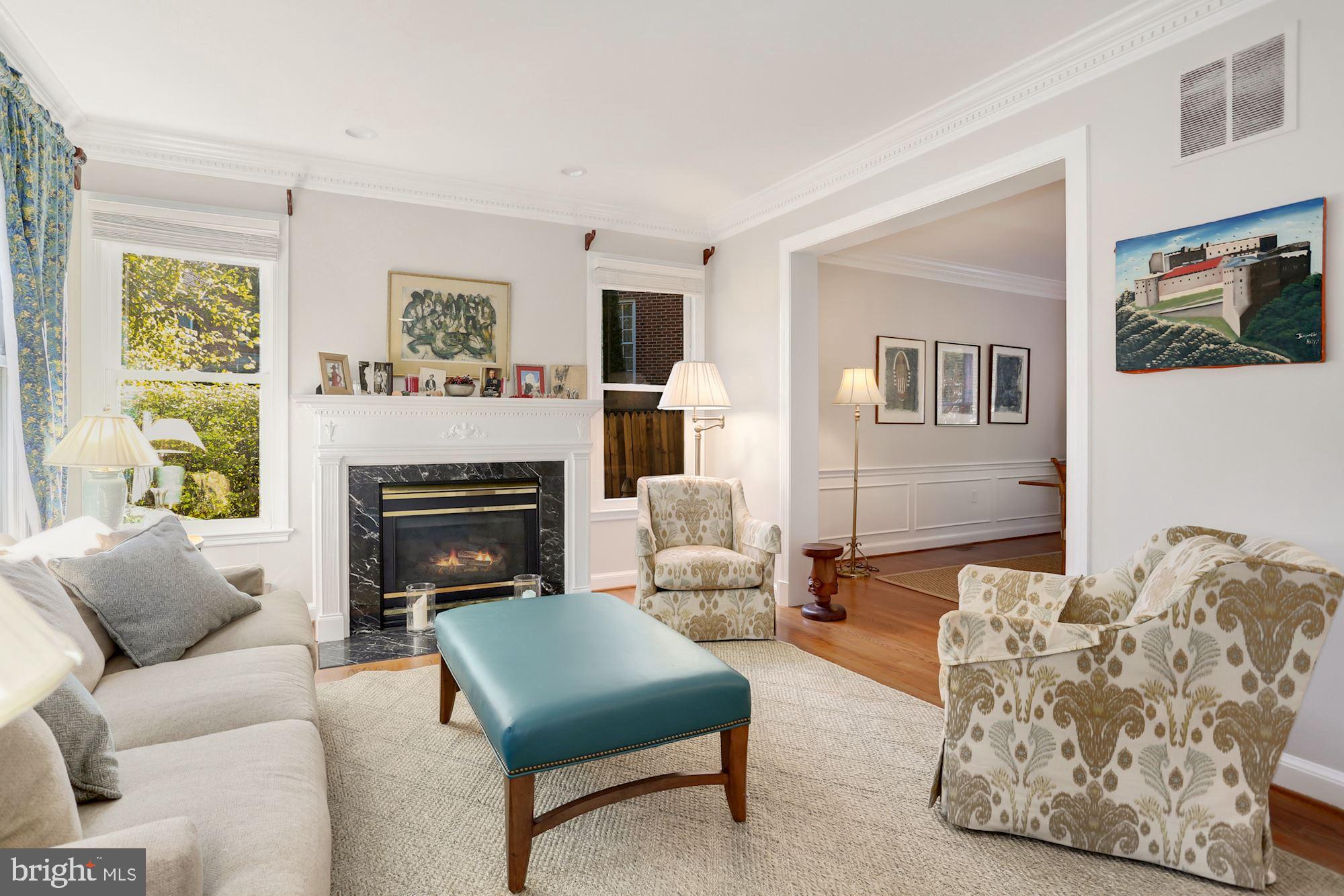 5108 Warren Place Northwest Washington, DC 20016 - Photo 4 of 32 Bright and Warm Living Area with Fireplace