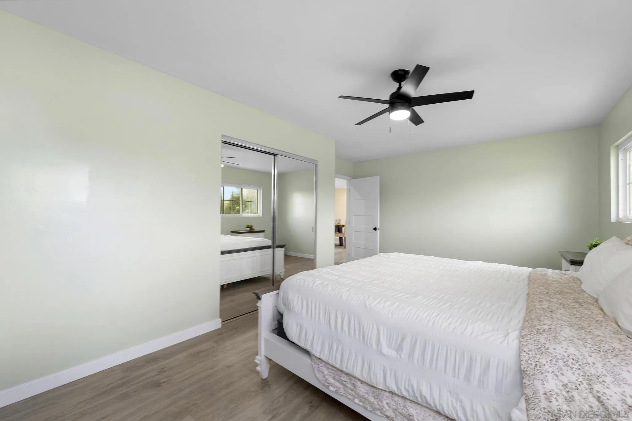 3232 Monterey Crest Drive Jamul, CA 91935 - Photo 16 of 52 a bedroom with a bed and a window