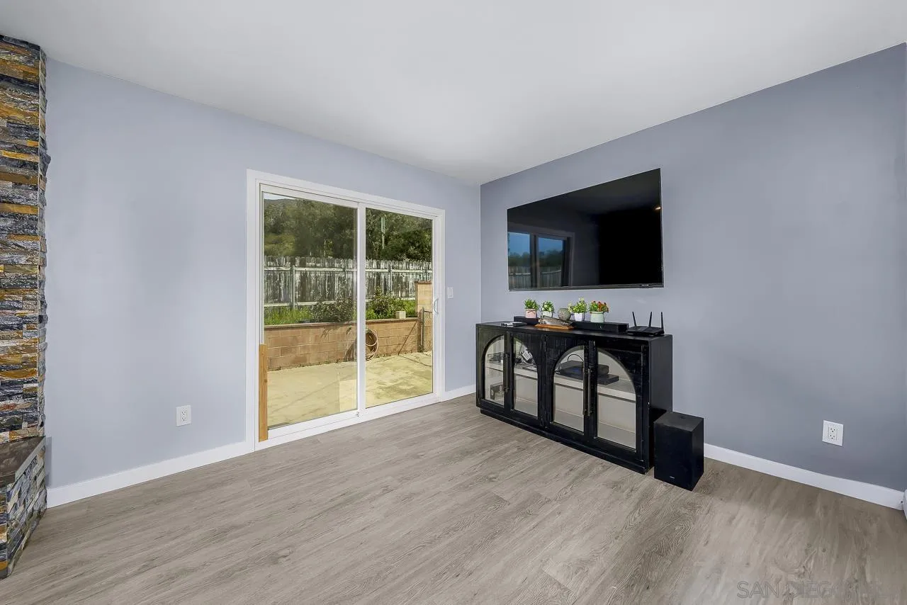 3232 Monterey Crest Drive Jamul, CA 91935 - Photo 29 of 52 a living room with furniture and a flat screen tv