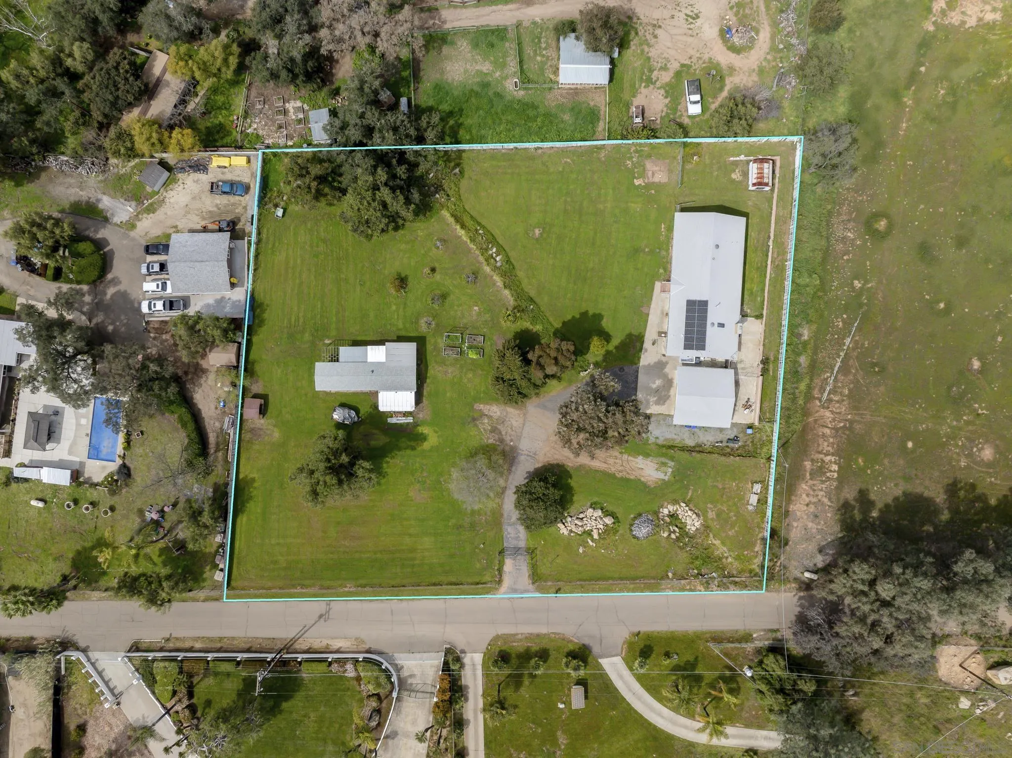 3232 Monterey Crest Drive Jamul, CA 91935 - Photo 3 of 52 an aerial view of a residential houses with outdoor space