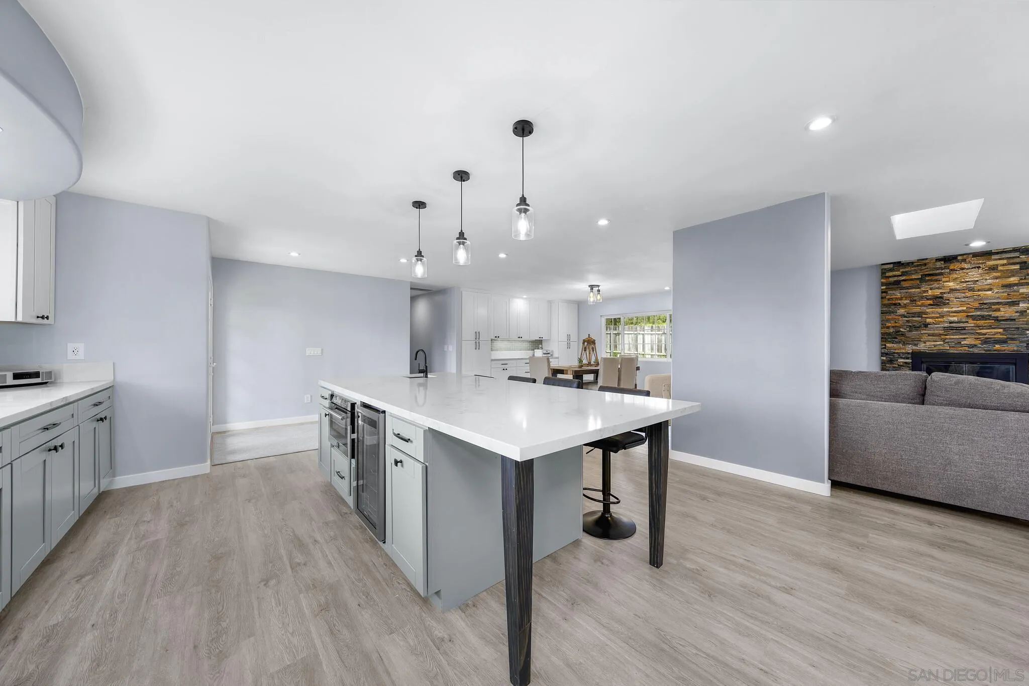 3232 Monterey Crest Drive Jamul, CA 91935 - Photo 36 of 52 a kitchen with a sink a counter top space and stainless steel appliances