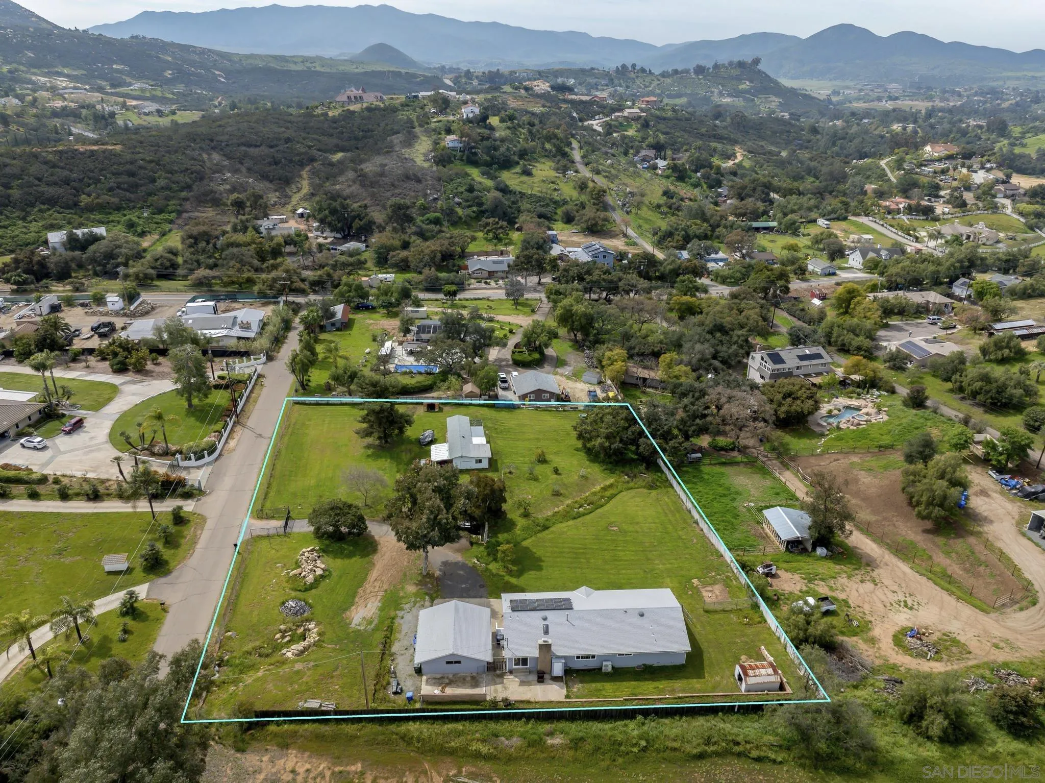3232 Monterey Crest Drive Jamul, CA 91935 - Photo 39 of 52 an aerial view of houses with a lake