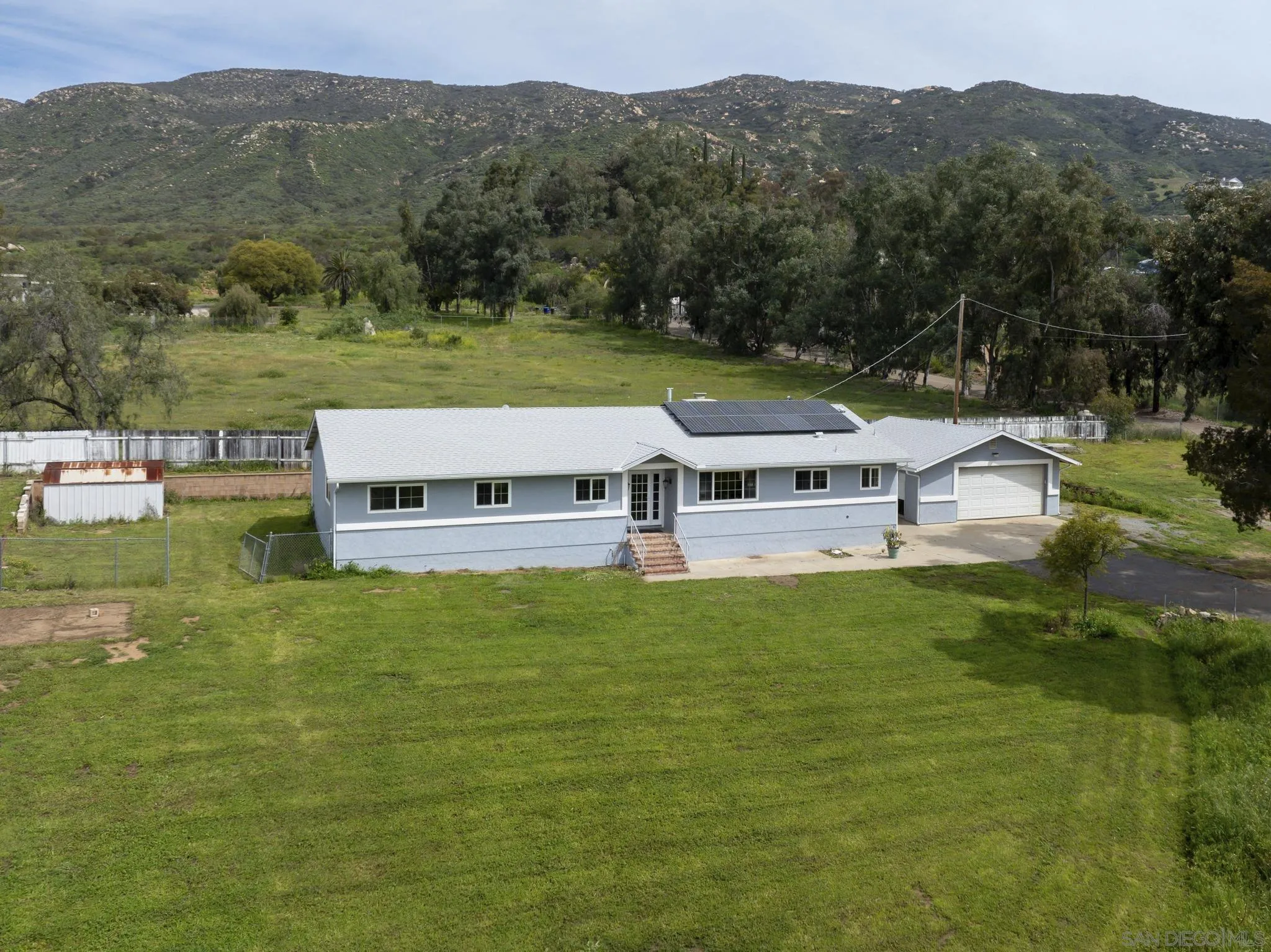 3232 Monterey Crest Drive Jamul, CA 91935 - Photo 45 of 52 a view of a house with a big yard