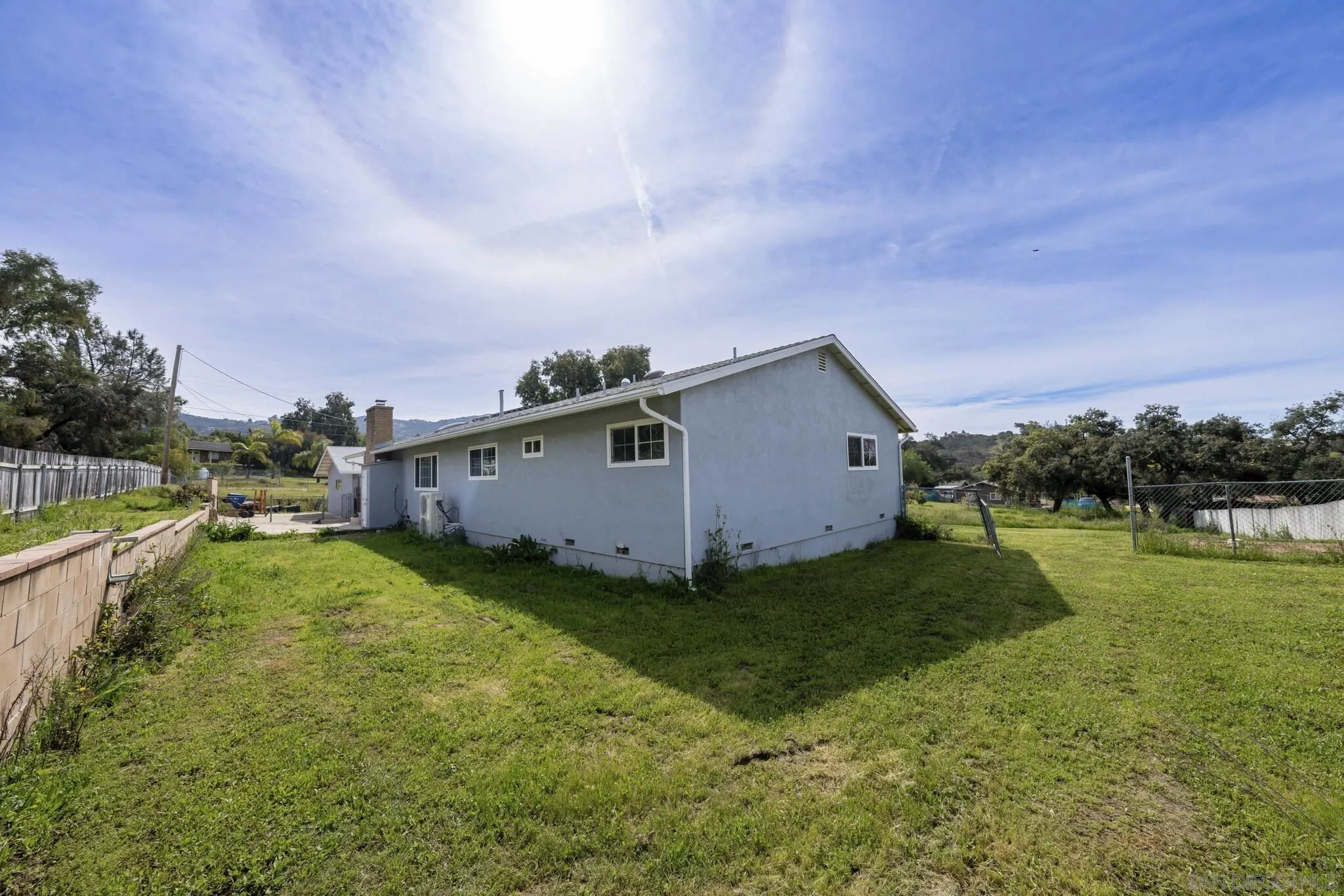 3232 Monterey Crest Drive Jamul, CA 91935 - Photo 46 of 52 a backyard of a house with table and chairs