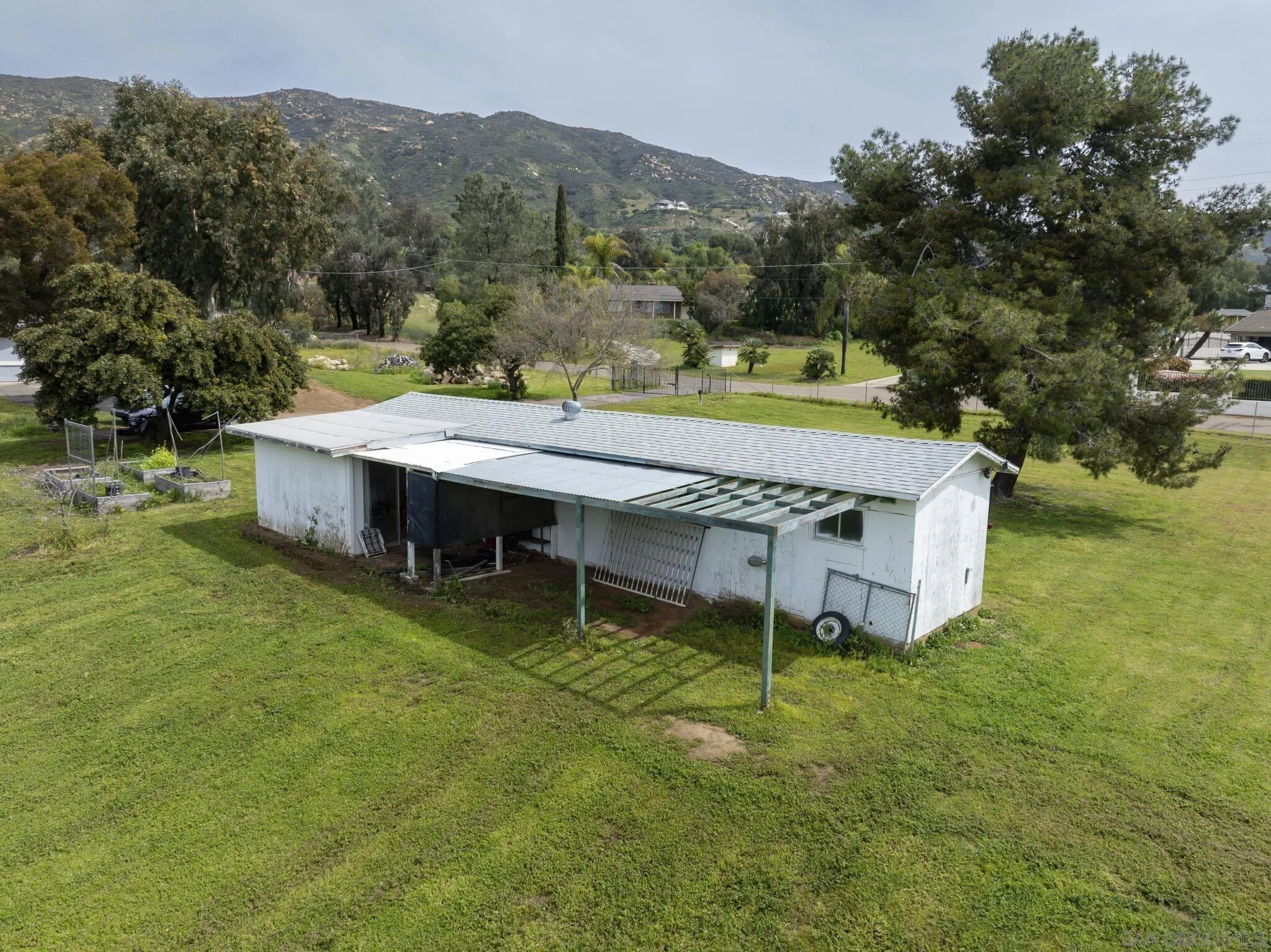 3232 Monterey Crest Drive Jamul, CA 91935 - Photo 49 of 52 an aerial view of a house having yard